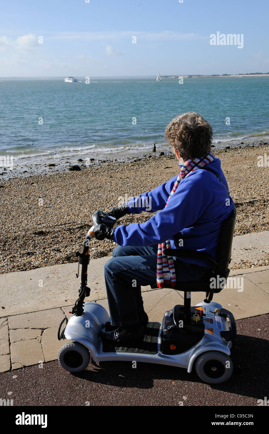 Women on a mobility scooter hi-res stock photography and images - Alamy