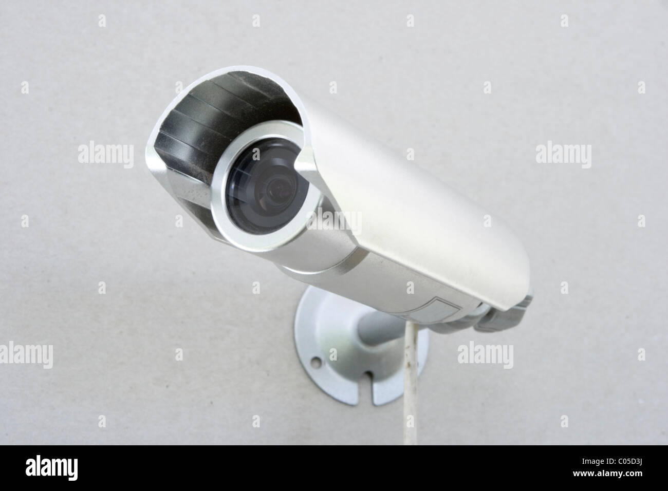 video camera of the spying and record bolted on wall Stock Photo