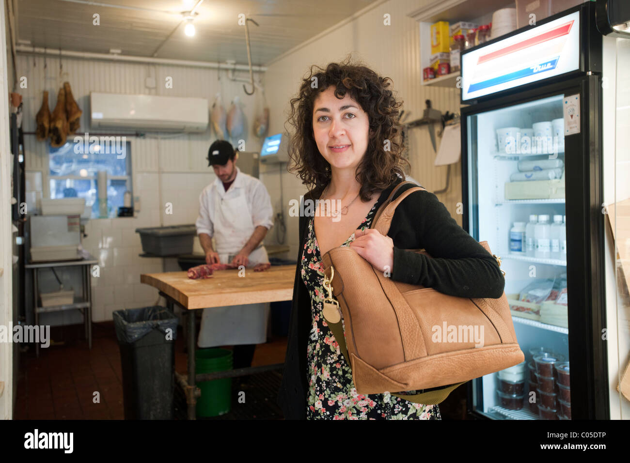 A Breton tote bag is modeled in a butcher shop in New York Stock Photo
