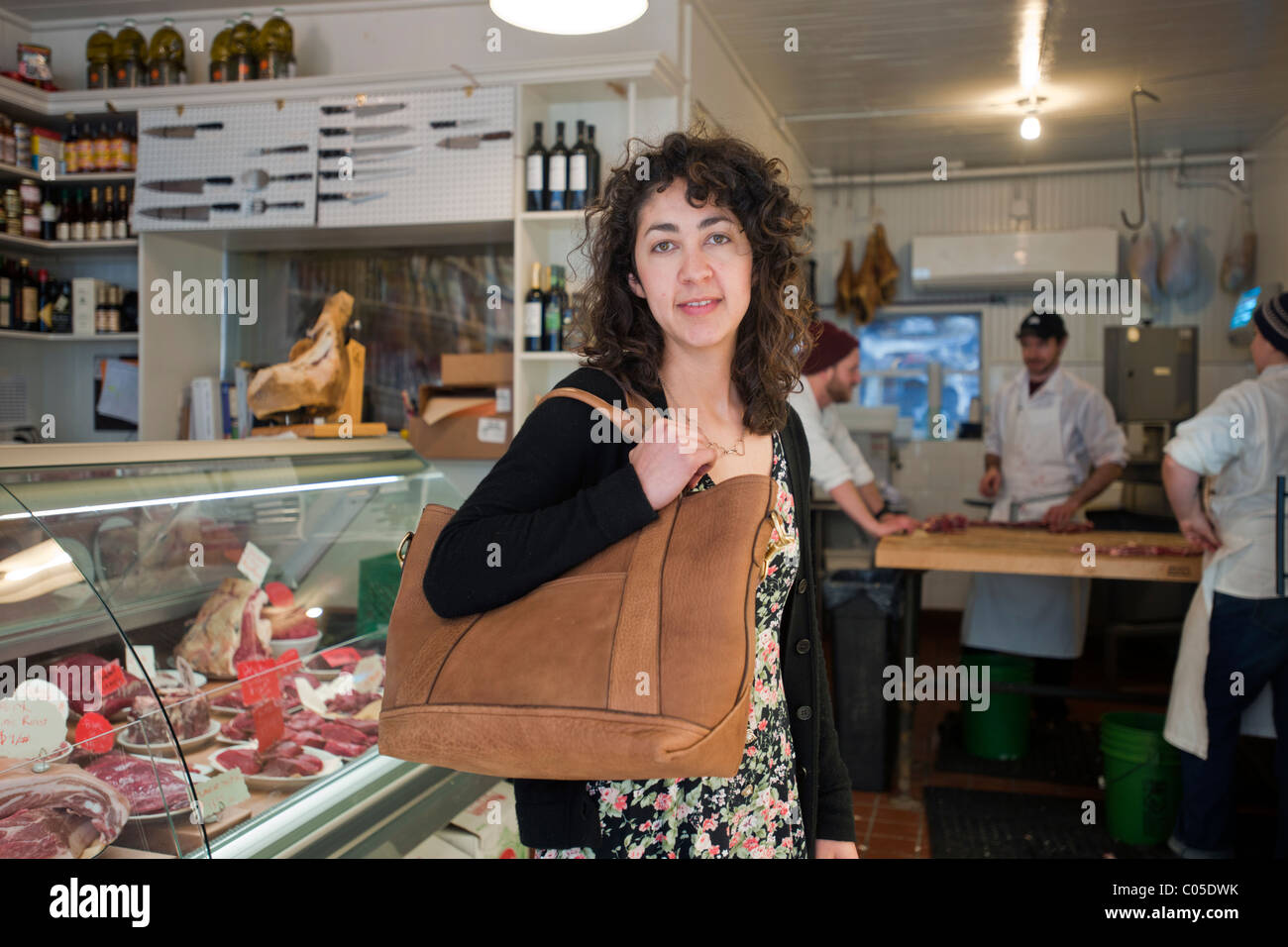 A Breton tote bag is modeled in a butcher shop in New York Stock Photo