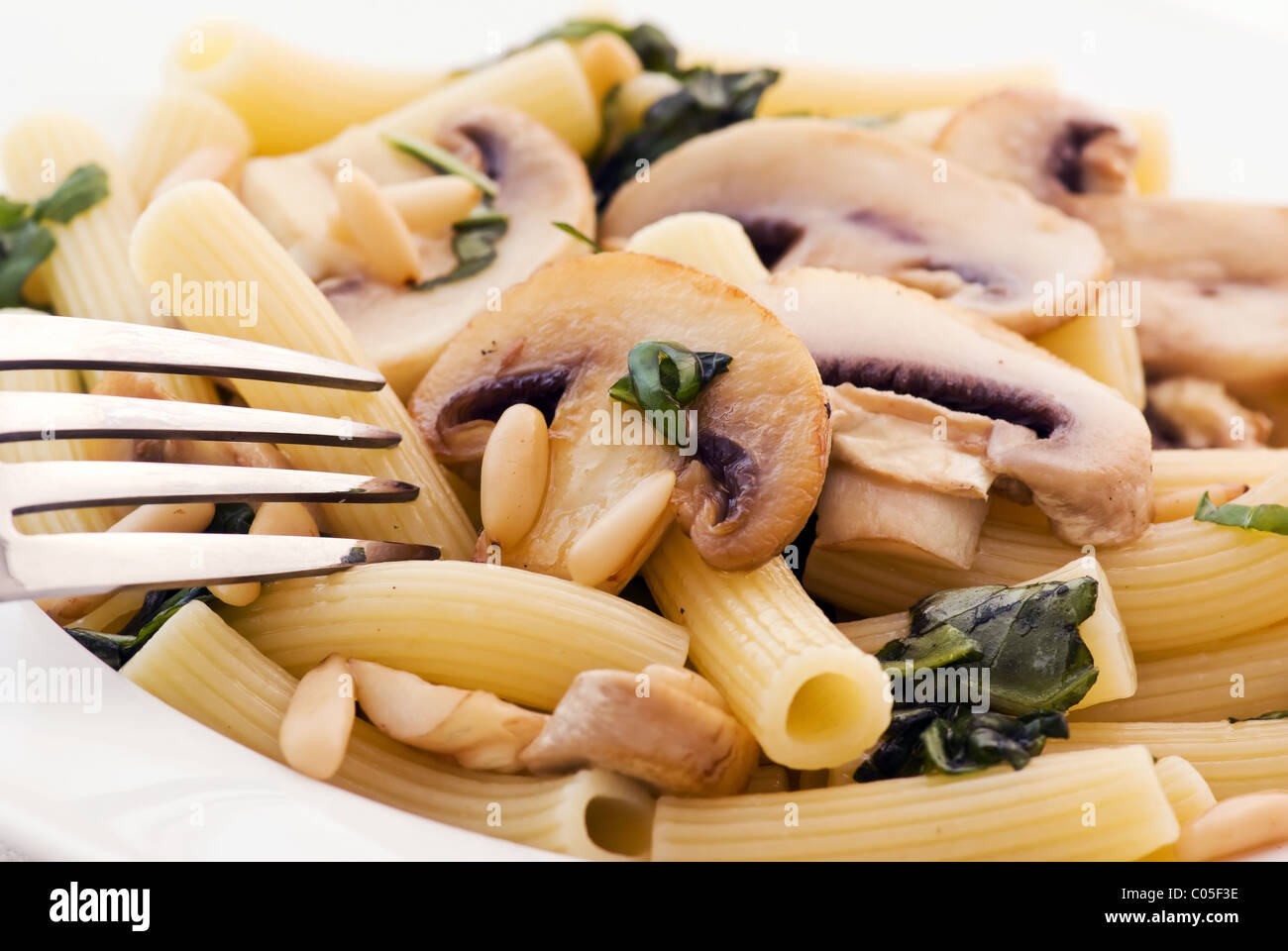 Rigatoni with mushrooms Stock Photo