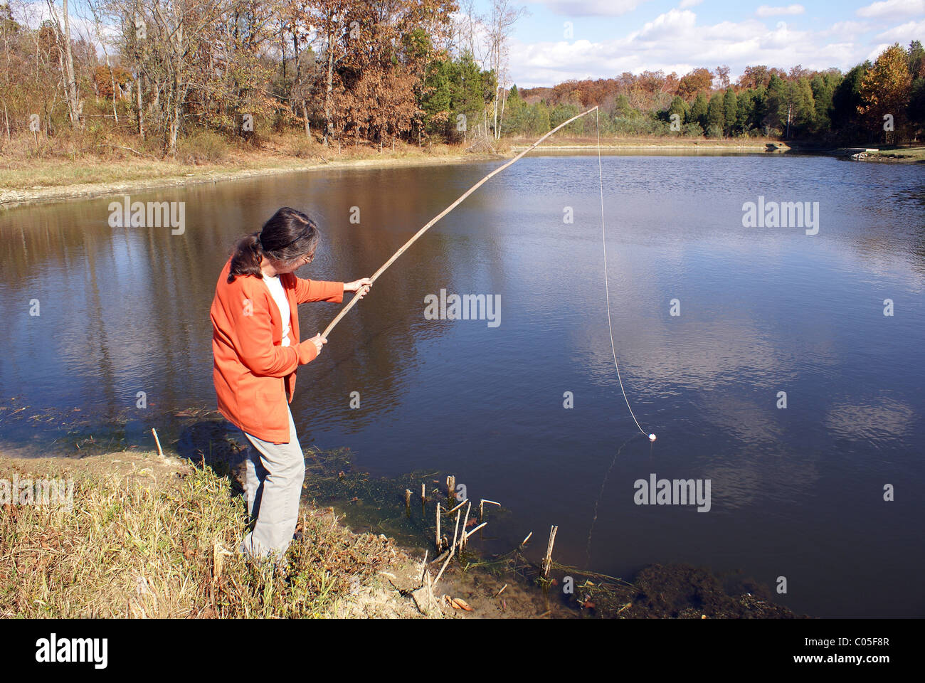 Bamboo fishing pole hi-res stock photography and images - Alamy
