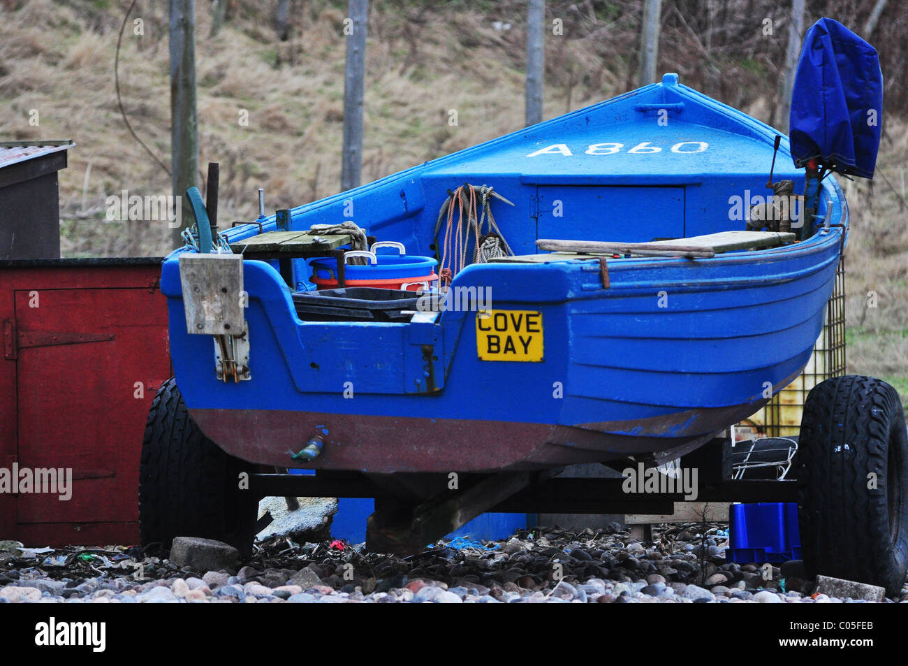 blue fishing boat Stock Photo - Alamy
