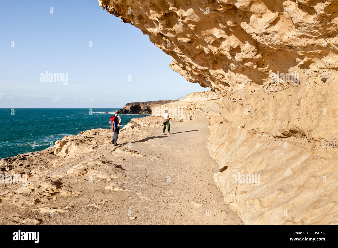 Wave rock formations beside the clifftop footpath near Ajuy on the west coast of the Canary Island of Fuerteventura Stock Photo