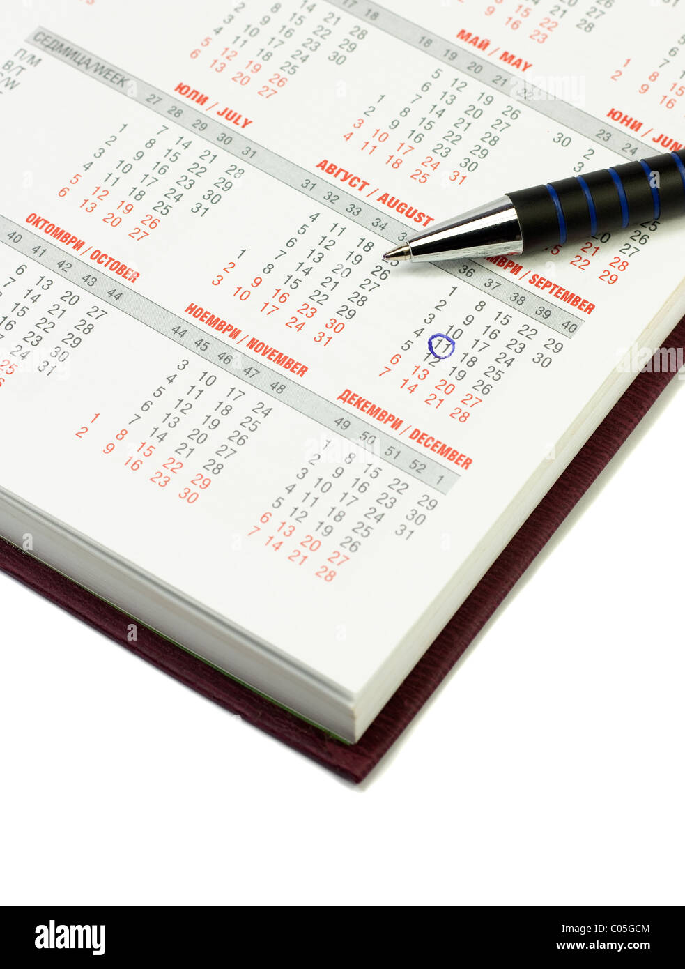 Calendar and pen over white background. September 11 checked Stock Photo