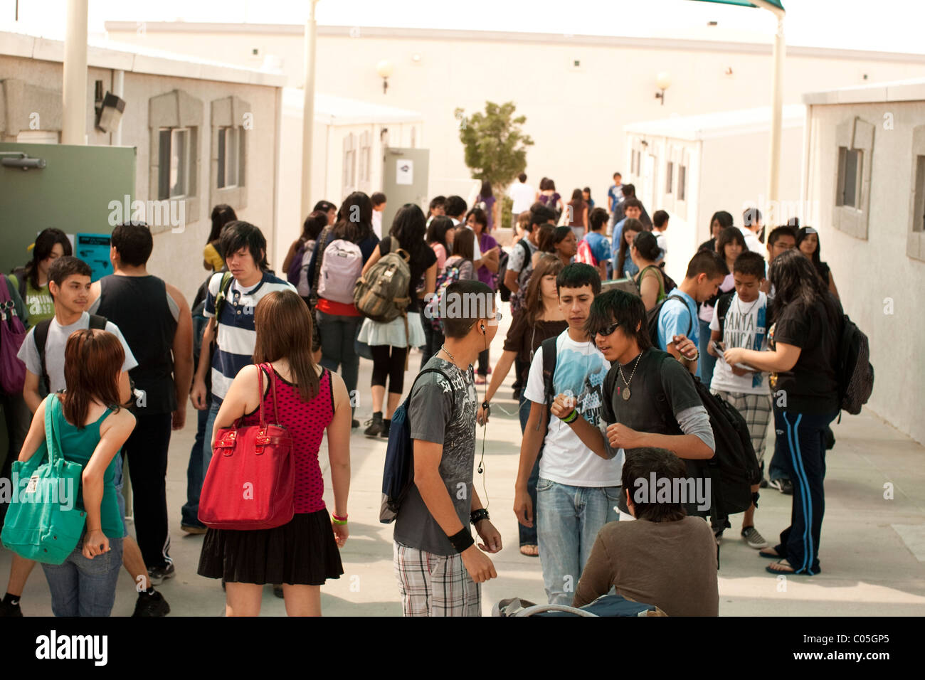 Students congregate in courtyard outside classrooms while changing classes at Mission Early