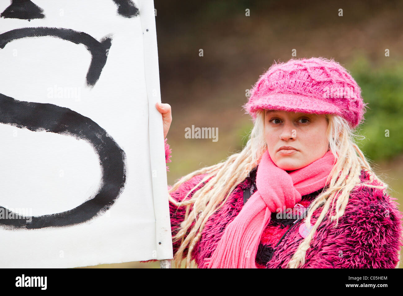 A woman protesting in Grizedale Forest, Lake District, against the governments proposals to sell off Forestry Commission land Stock Photo