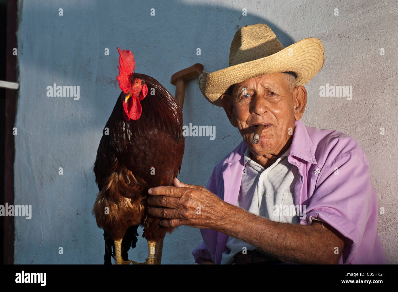Local Man with chicken Street scene Trinidad province of Sancti ...
