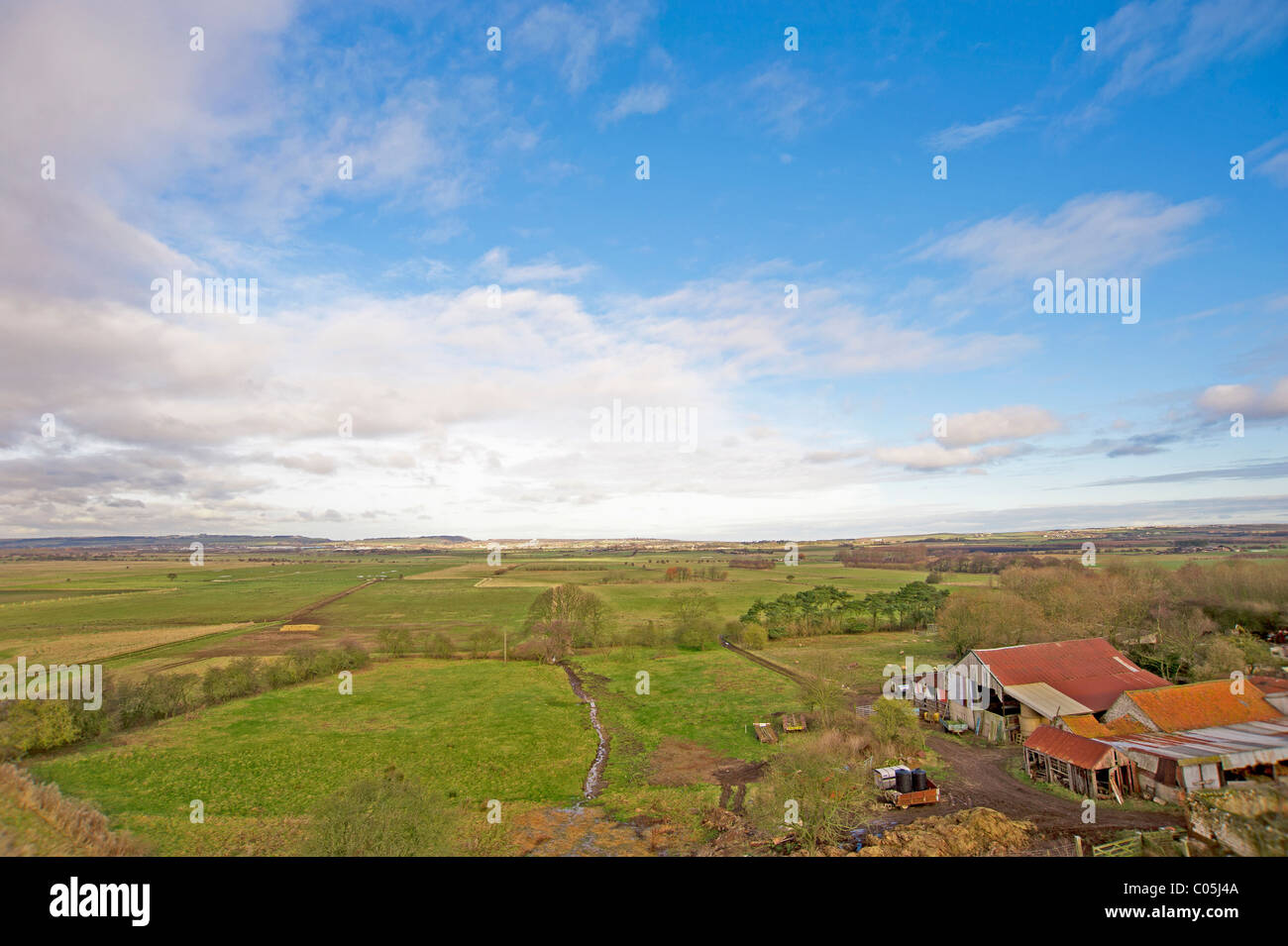 Landscape view over fields of a countryside farm Stock Photo