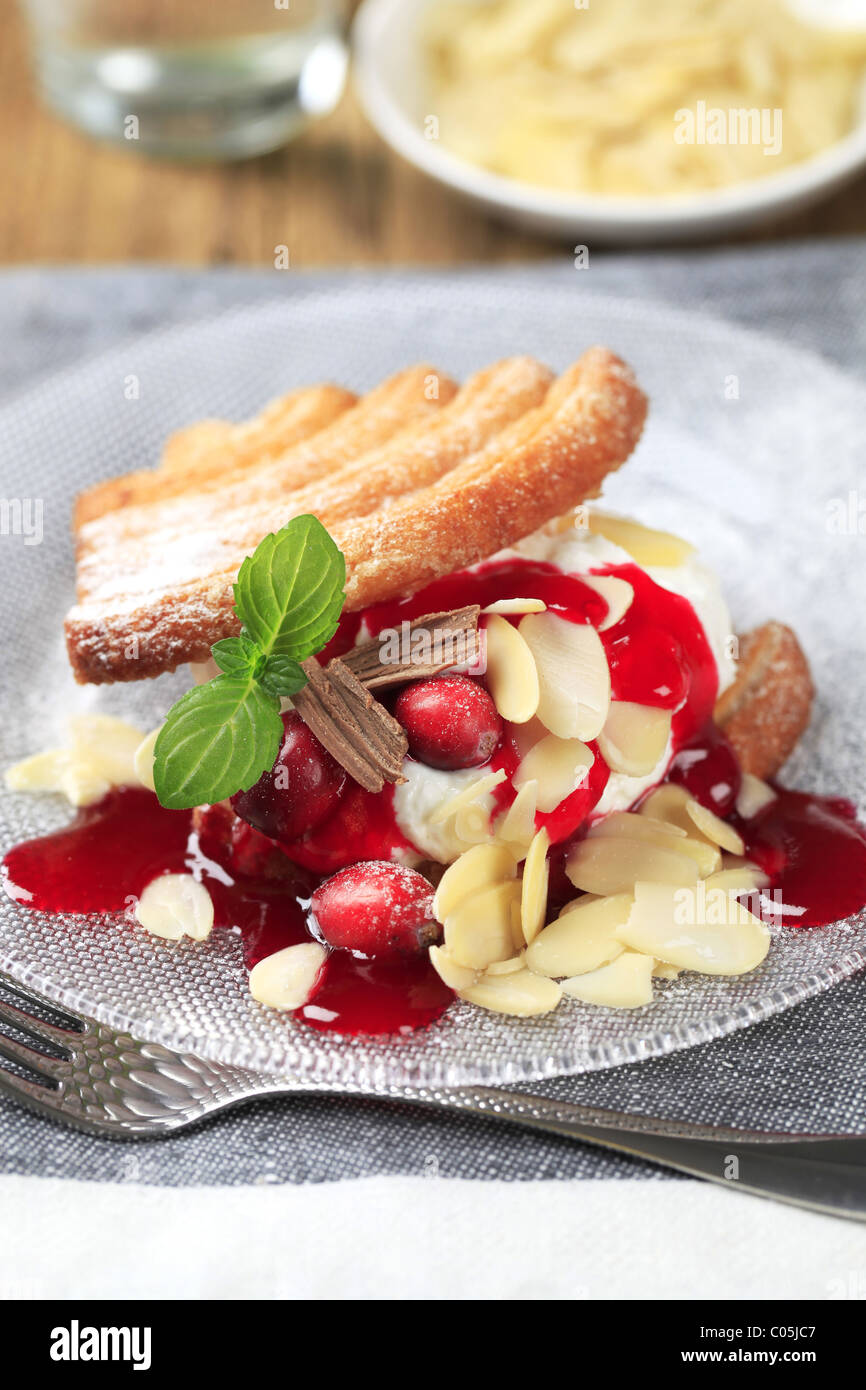 Dessert - Waffles with cream cheese, cranberries and syrup Stock Photo