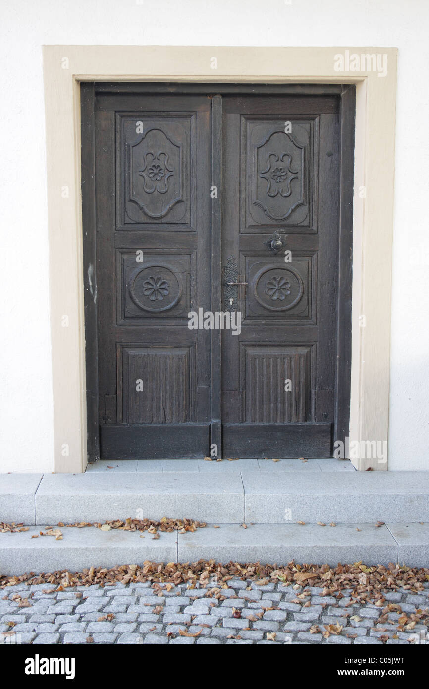 beautiful wooden door of an old house Stock Photo