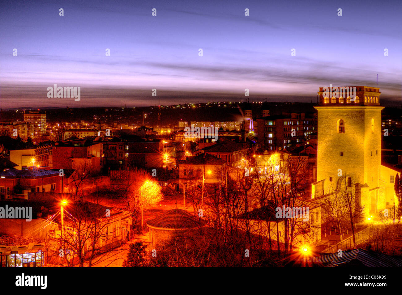 Sunset over the city Stock Photo - Alamy