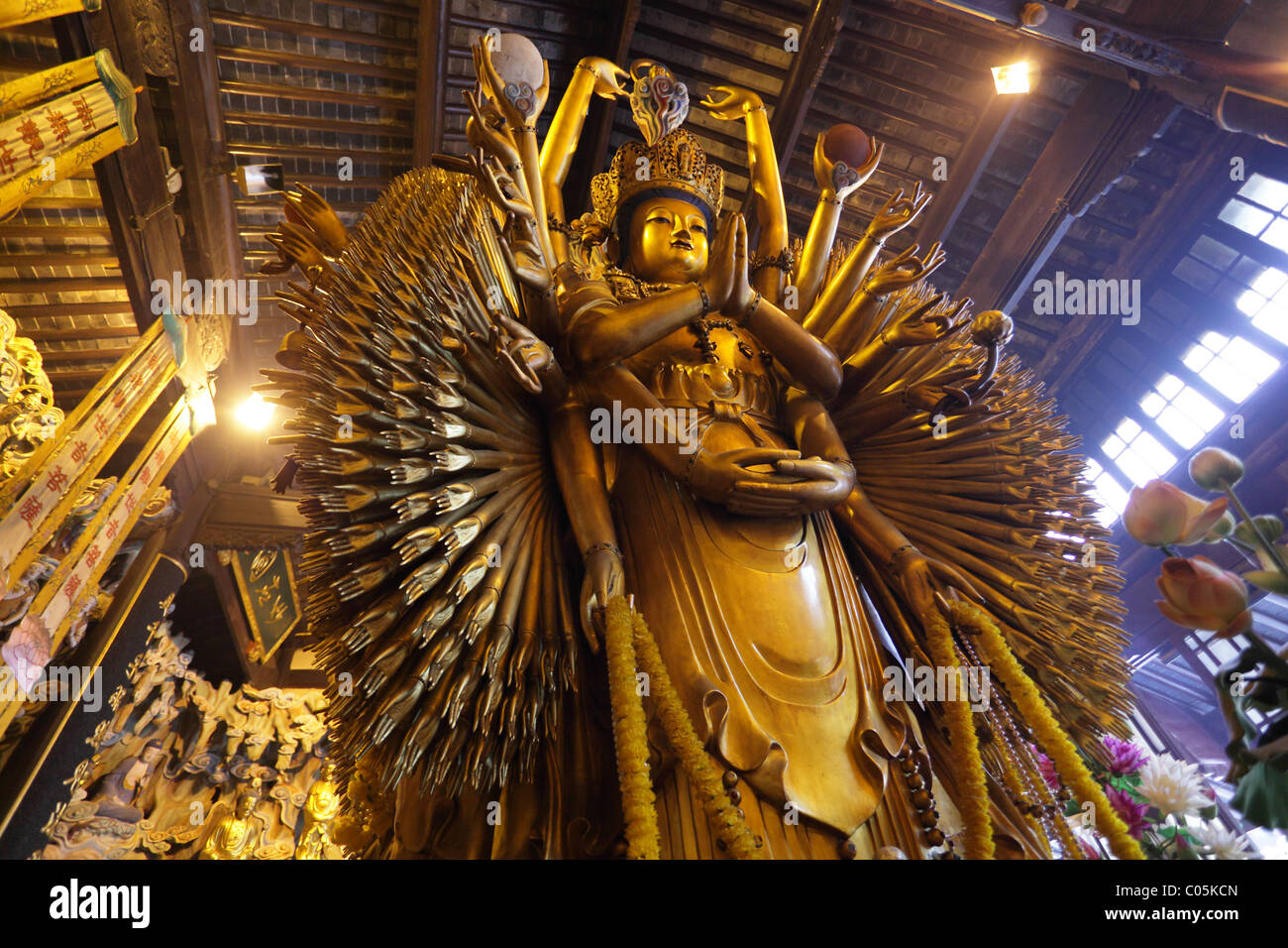 Thousand arms god statue in Longhua temple, Shanghai China Stock Photo
