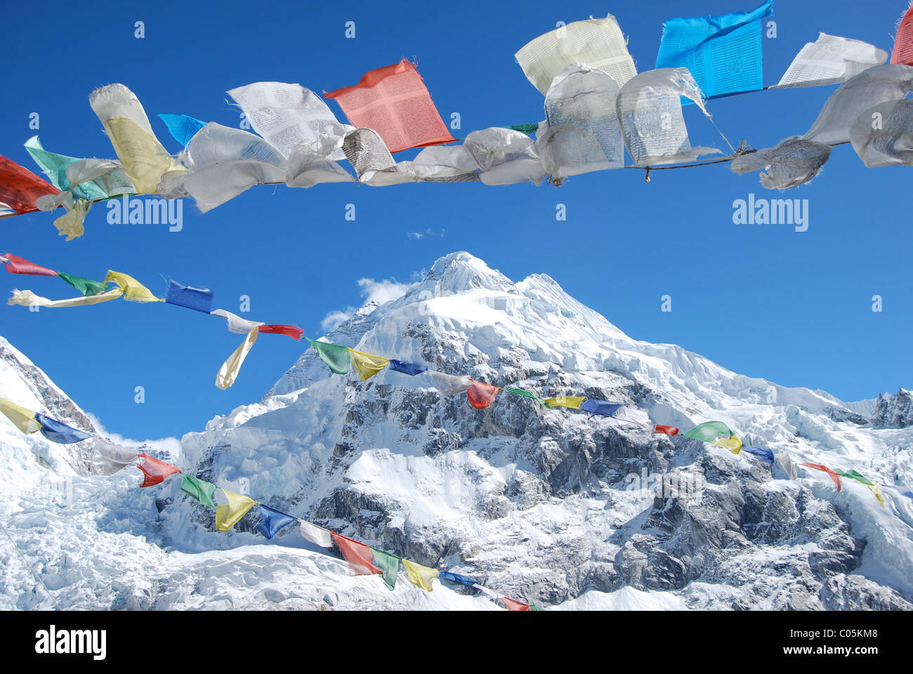 Mount Everest and Prayer Flags Stock Photo
