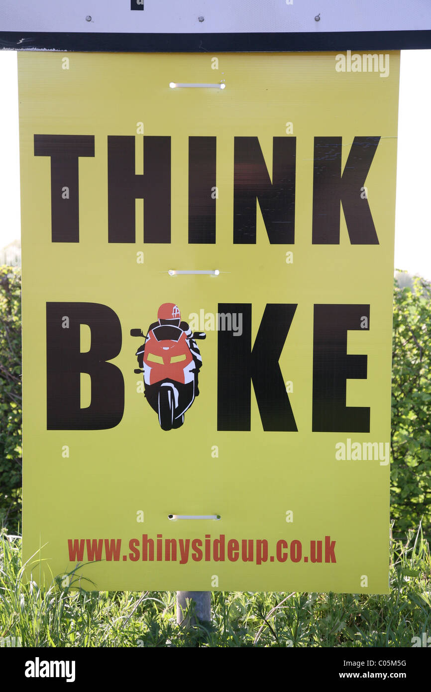 sign reminding motorist to look for motorbikes Stock Photo