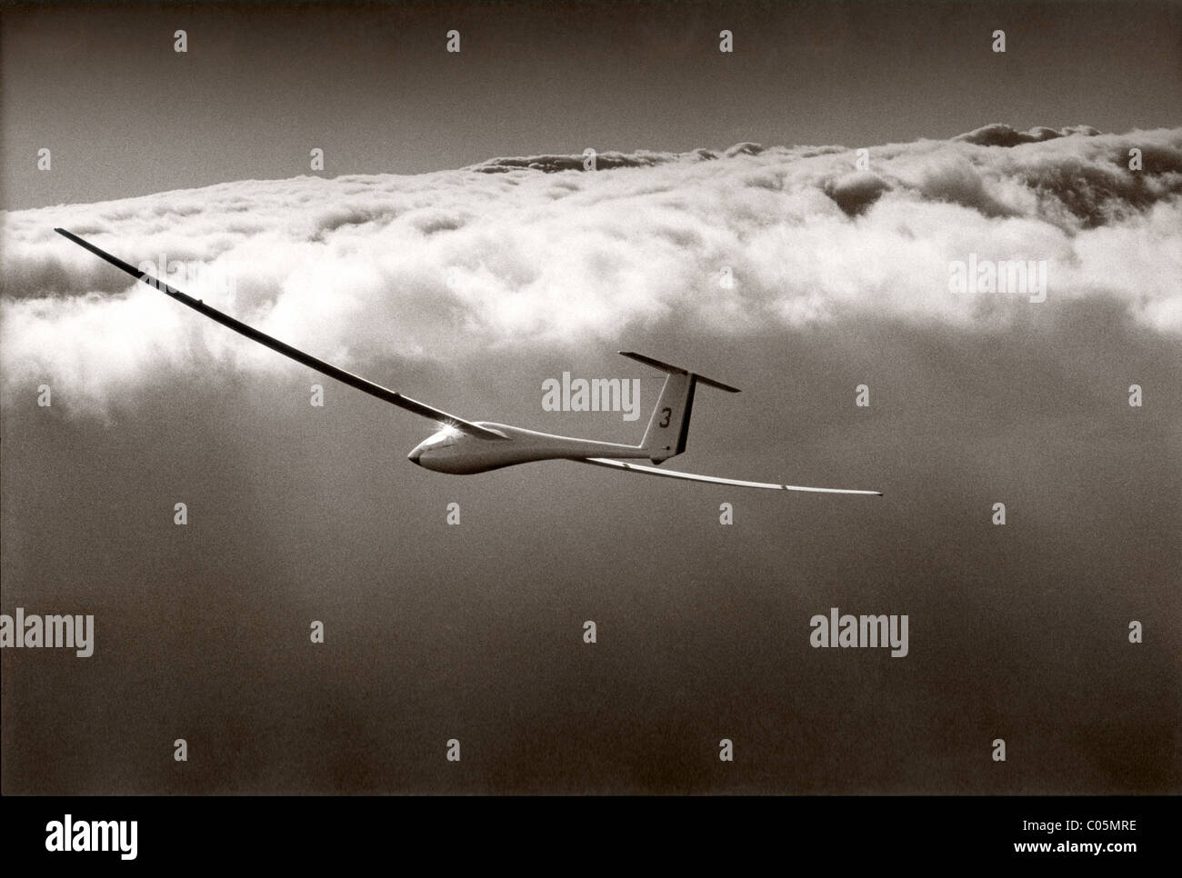 Glider above the clouds Stock Photo