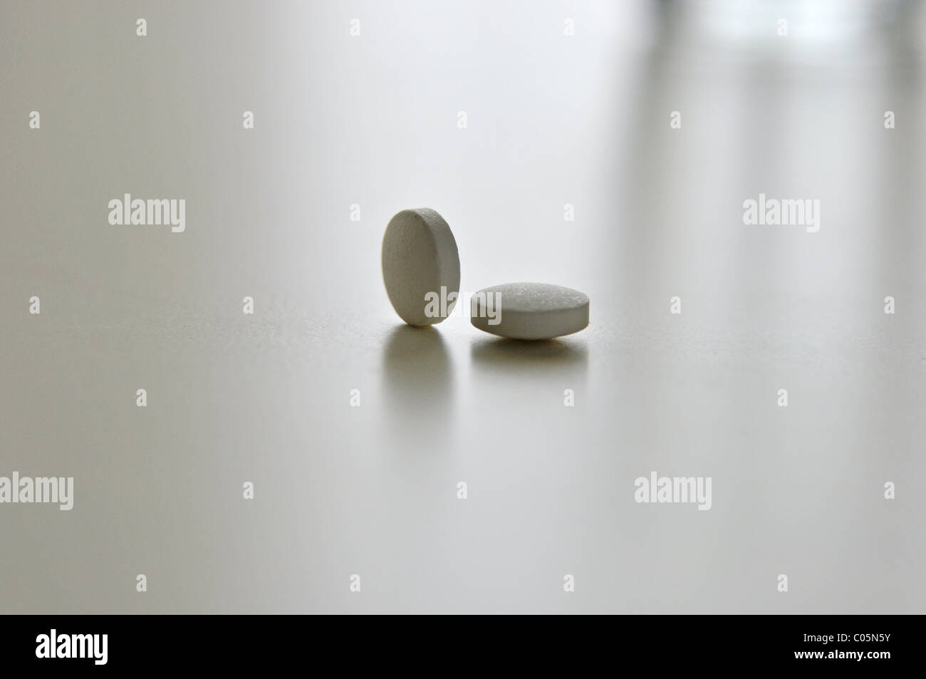close up of two pills Stock Photo
