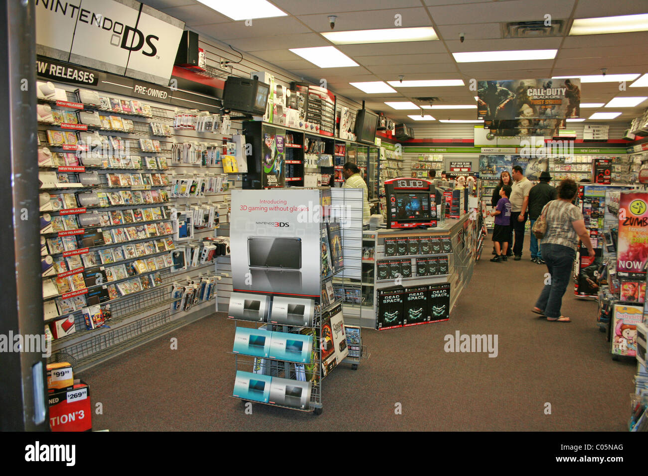 Inside of a Gamestop computer video game store, United States, February 2011. Stock Photo