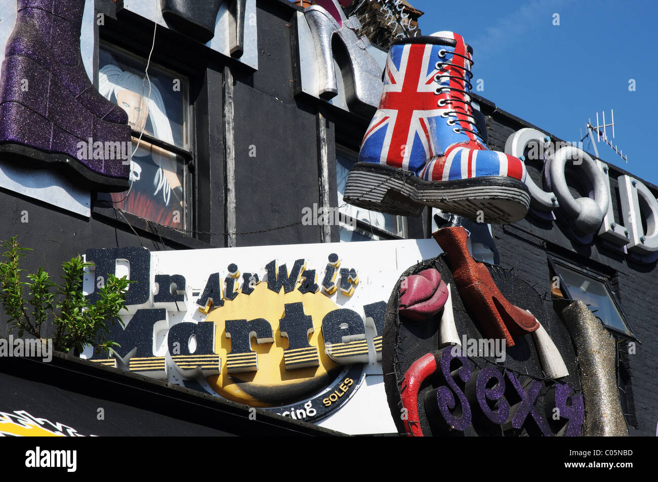 A large union jack design Doc Marten boot outside a shop in Camden Road, London Stock Photo