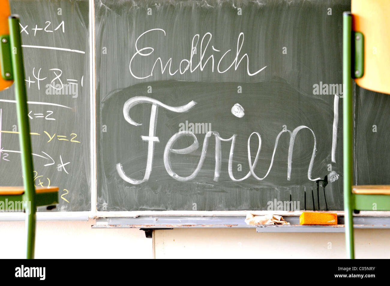 Blackboard with inscription: finally holiday Tafel mit Anschrieb: endlich Ferien Stock Photo