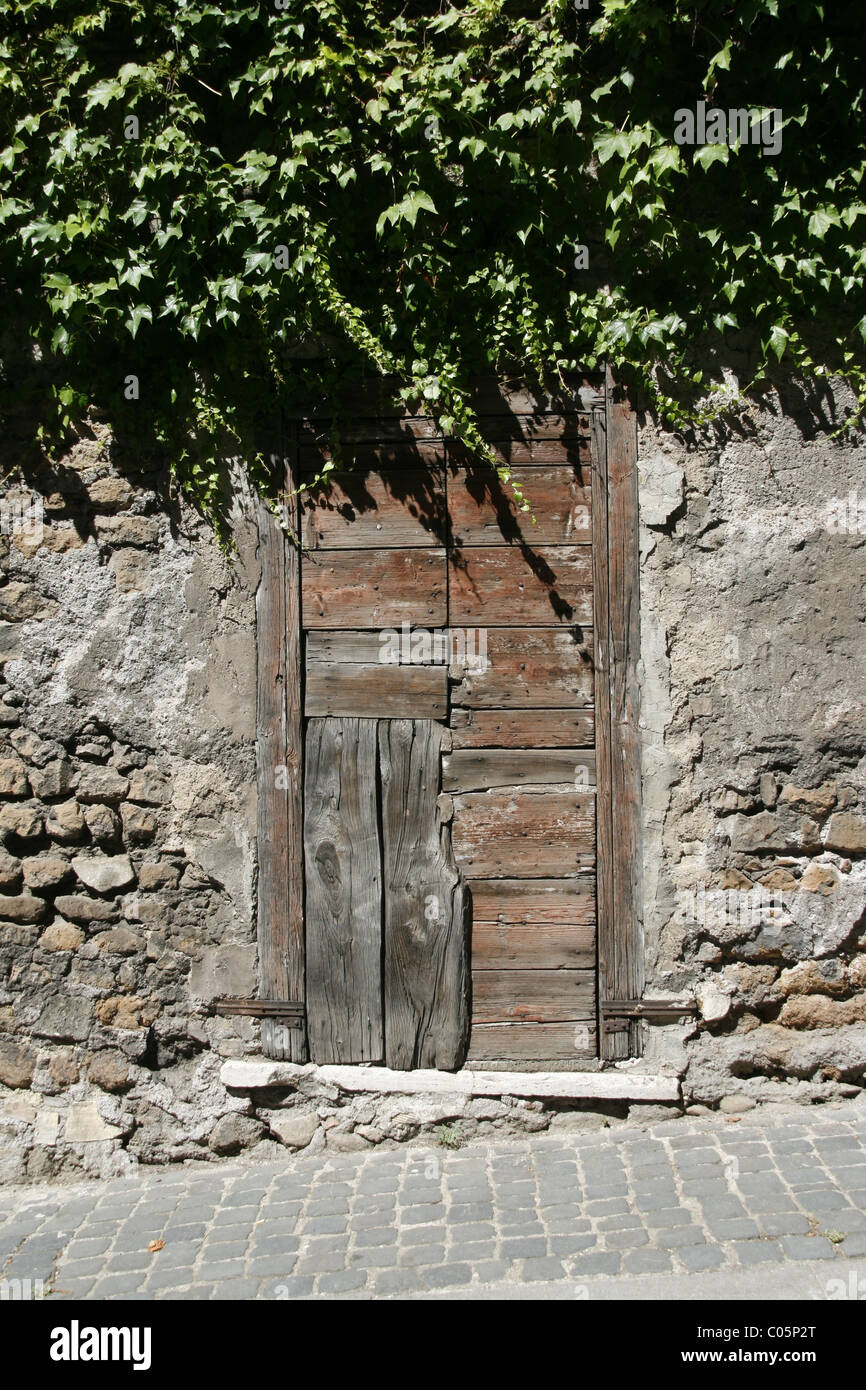 old wooden door on street in rome, italy Stock Photo - Alamy