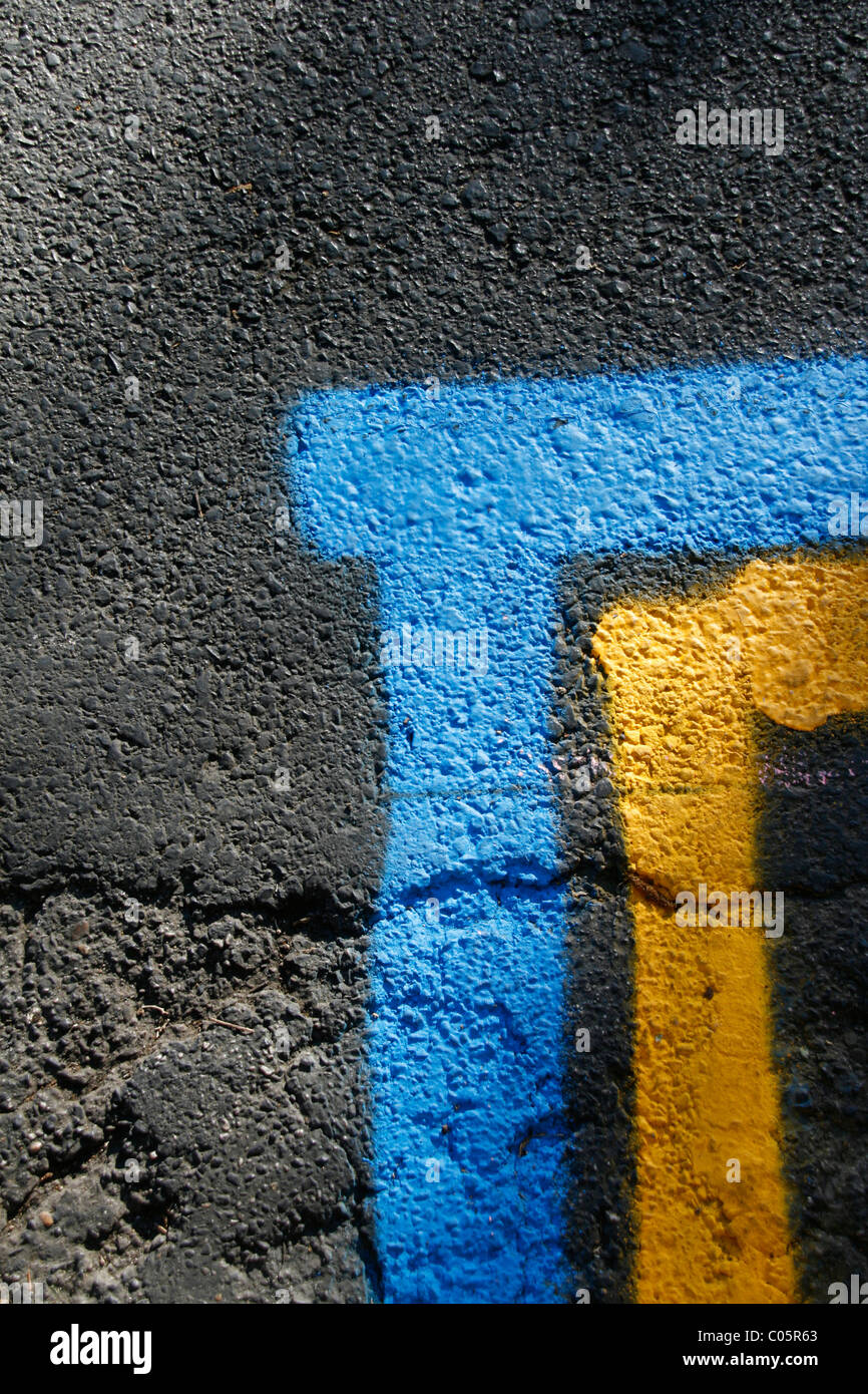 road surface with new painted street markings Stock Photo