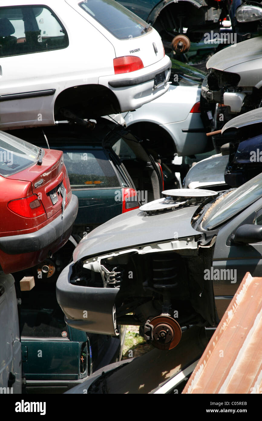 piled up spare parts and cars in breakers scrap yard Stock Photo Alamy
