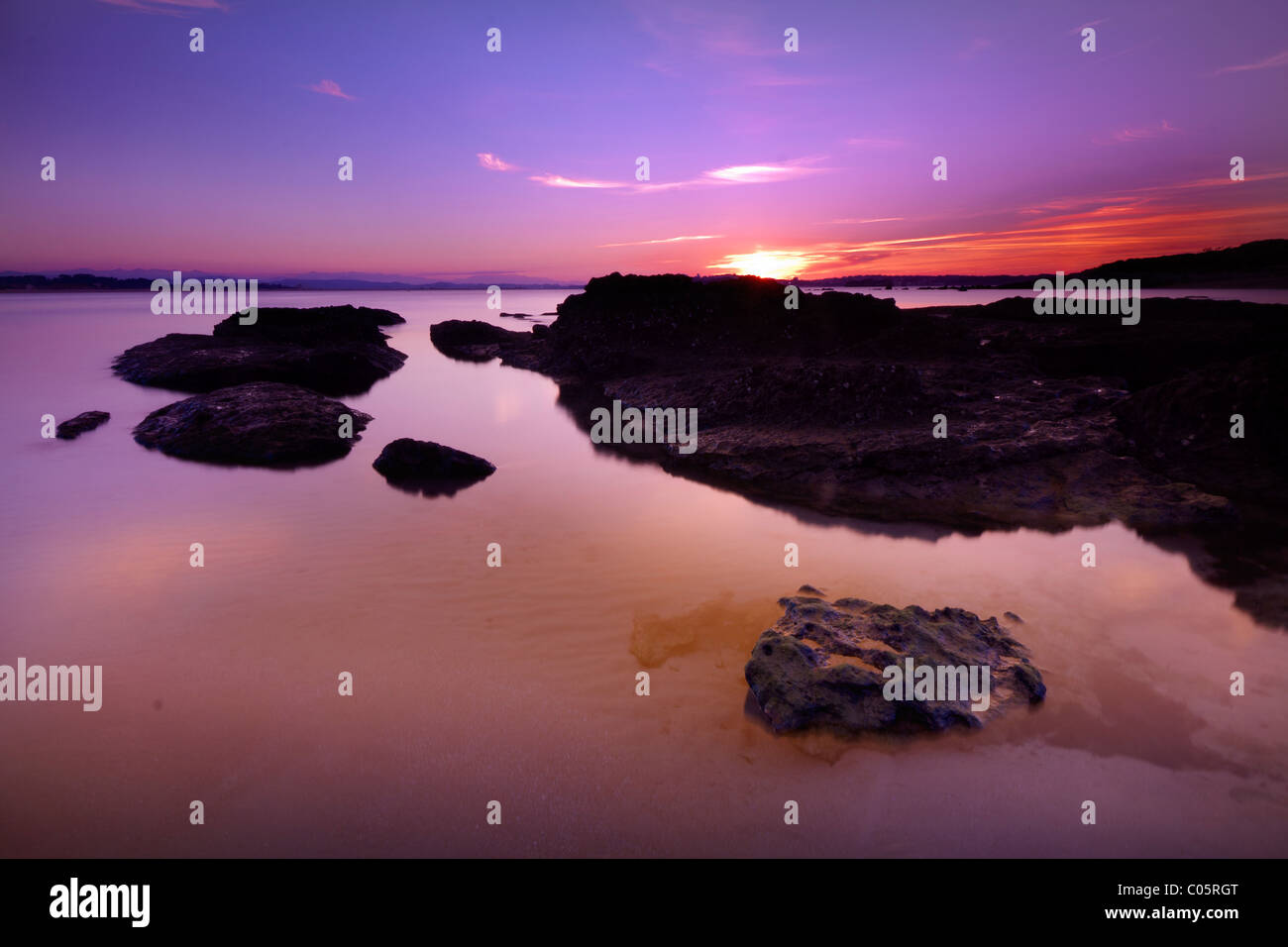 Twiligth. Cantabrian sea. Tidal ponds Stock Photo