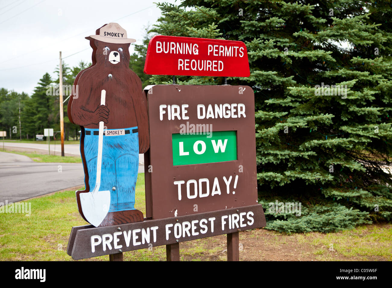 Smokey the Bear fire danger sign in the Northwoods of Wisconsin. Stock Photo