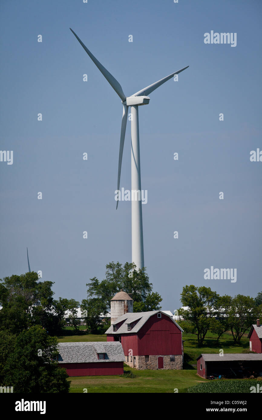 Wind turbine towers over a farm in Fond du Lac County Wisconsin. Stock Photo
