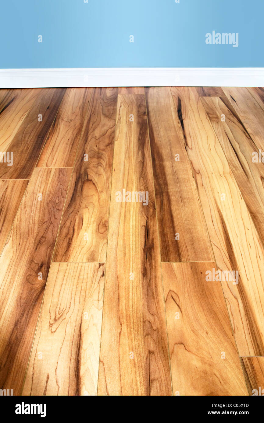 Wood floor and painted wall, perfect background. Stock Photo