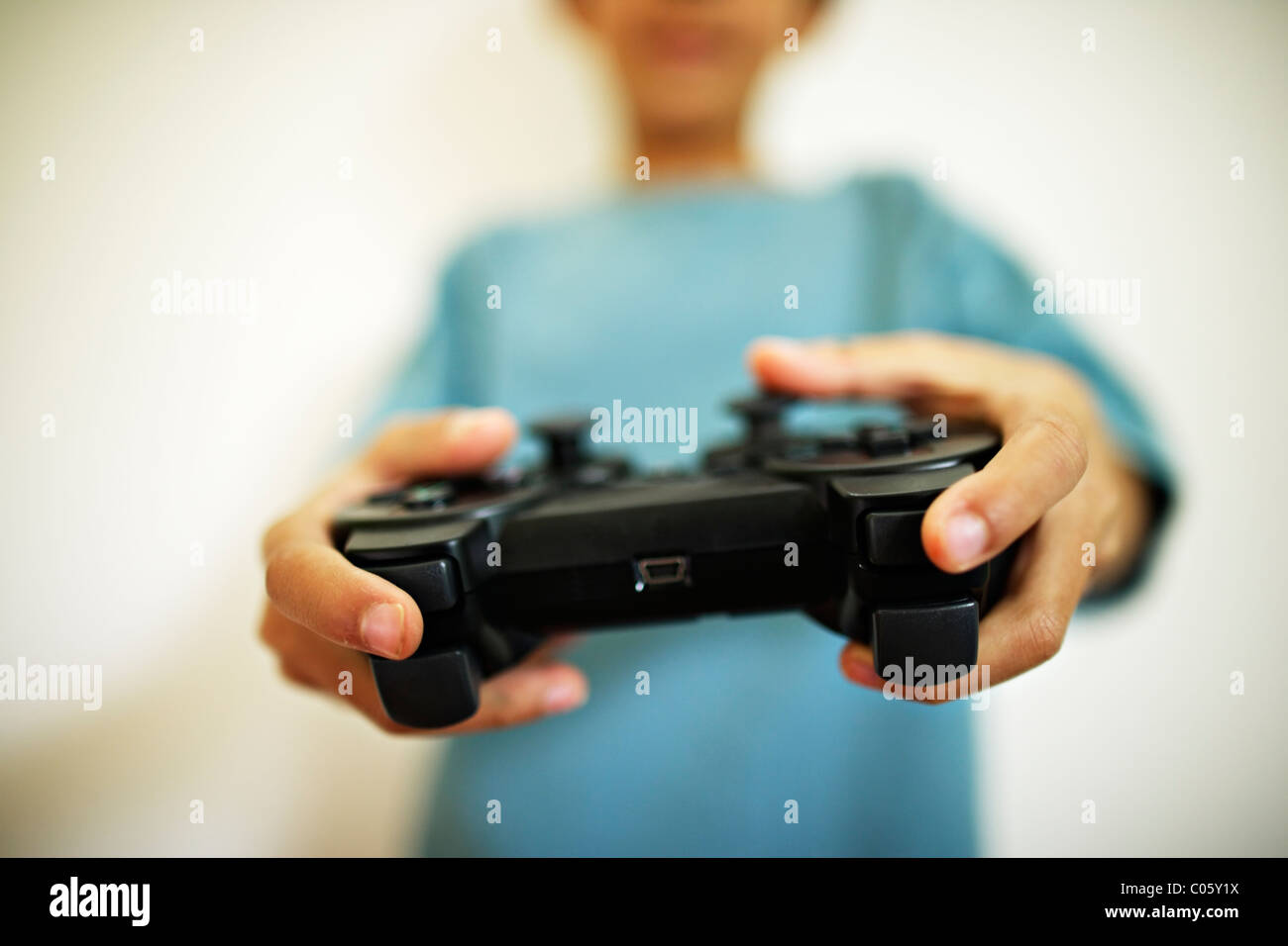 Boy plays computer games Stock Photo - Alamy