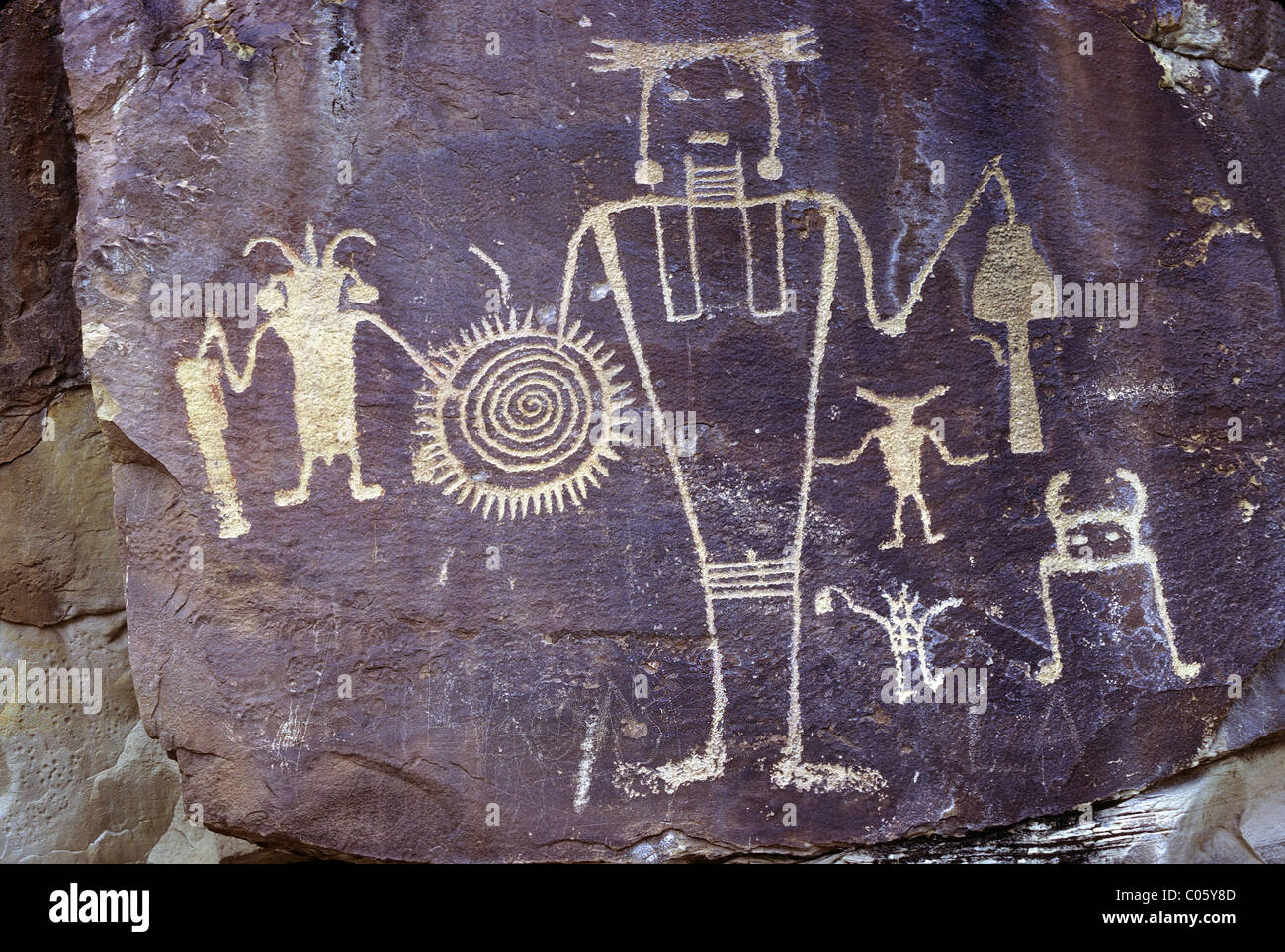 Fremont culture petroglyph on sandstone cliff with desert varnish, McKee Springs Panel, Dinosaur National Monument, Utah, USA. Stock Photo