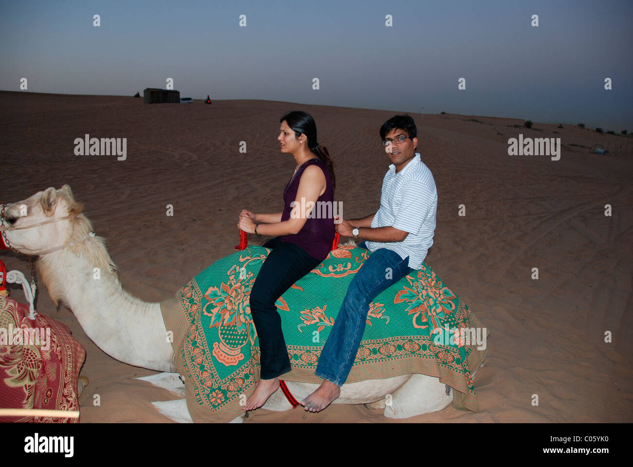 An Indian couple on a camel ride in Jaisalmer, India Stock Photo - Alamy