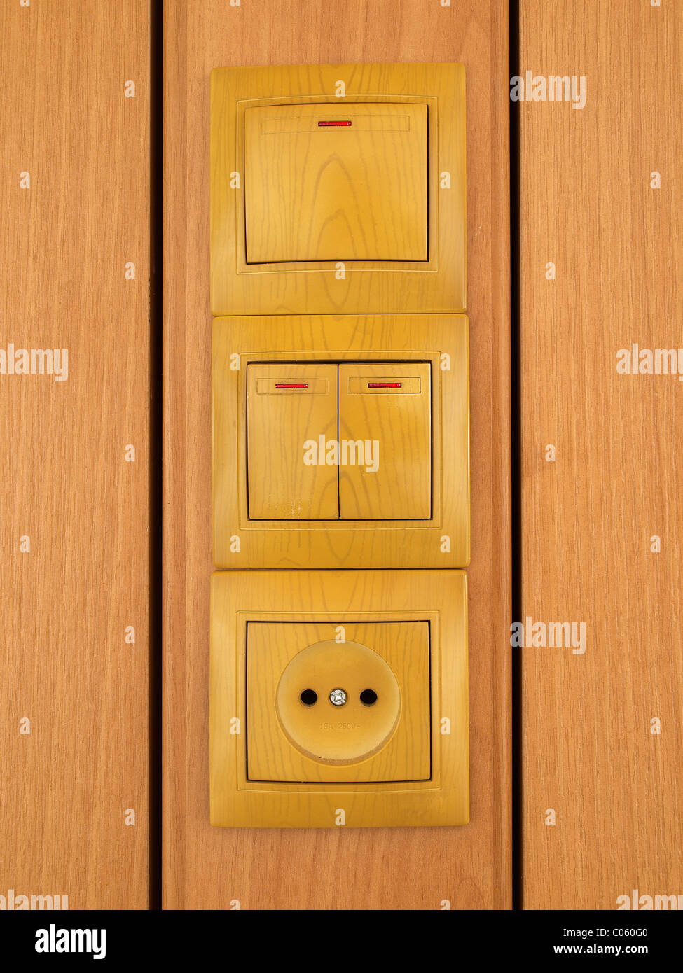 Wall outlets end electric switch on the brown wall Stock Photo Alamy