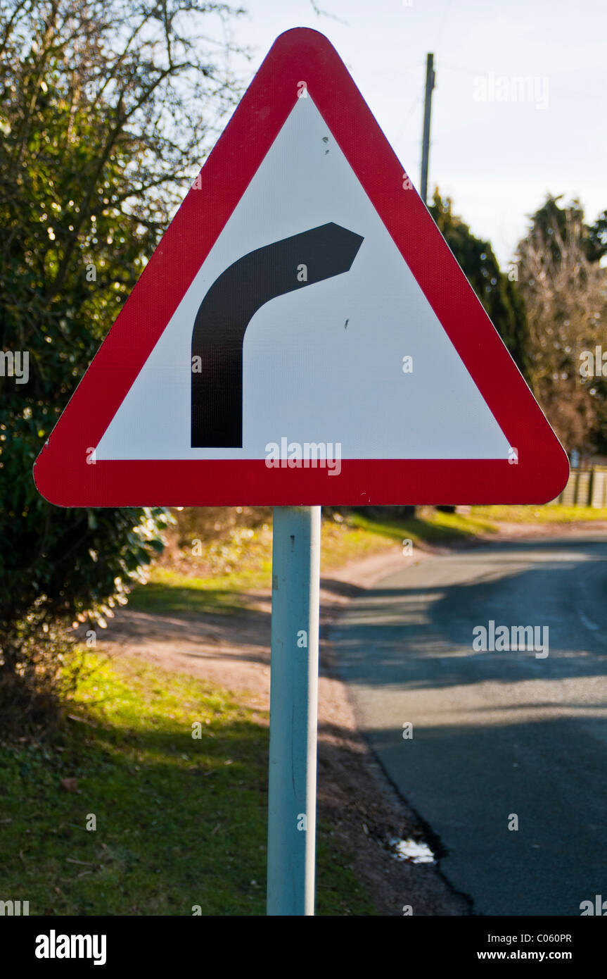Bend in the road warning sign Stock Photo