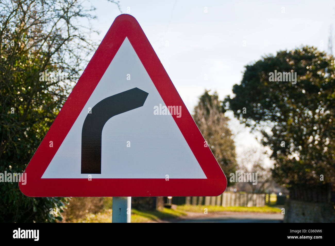 Bend in the road warning sign Stock Photo