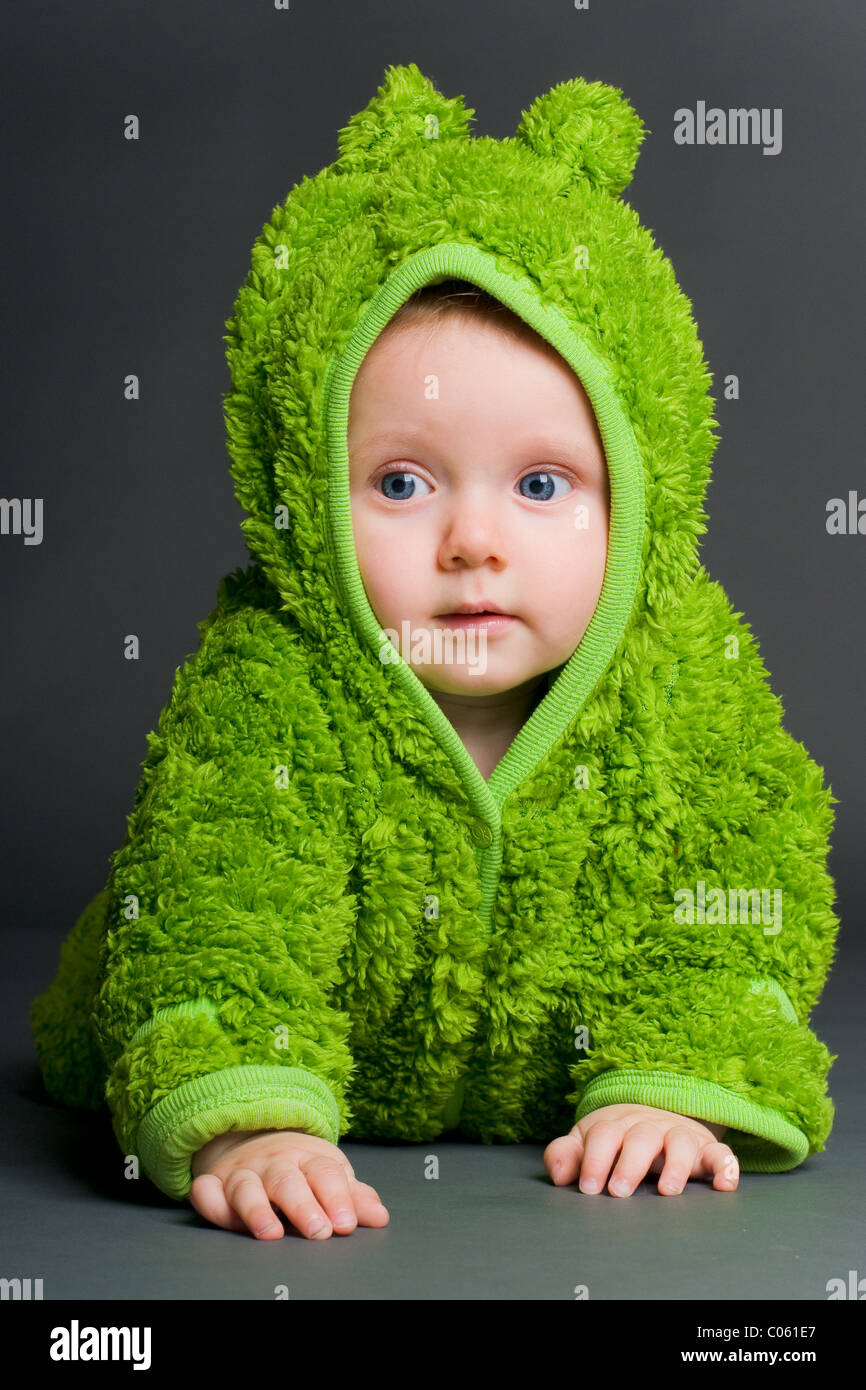 Baby wearing a frog costume Stock Photo Alamy