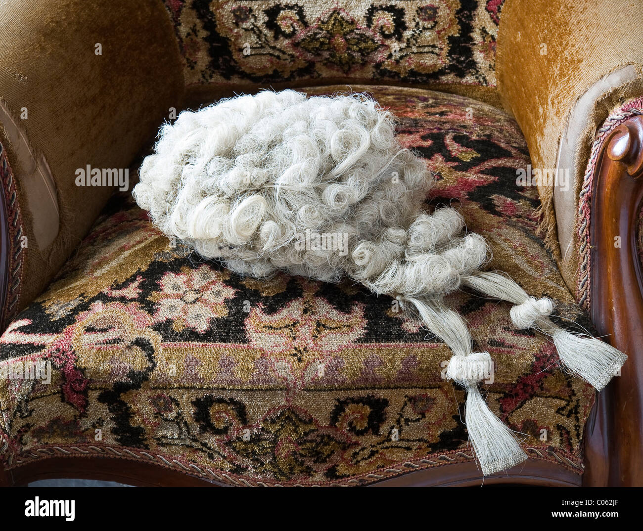 A lawyer's wig on an old armchair at the Judge's Lodging, Presteigne, Powys, UK, an award winning museum of Victorian life Stock Photo