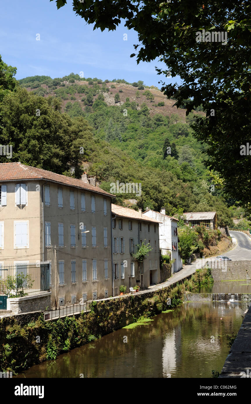 Le Juar river passing through town centre of St Pons de Thomieres a market town in the Herault district of Southern France Stock Photo