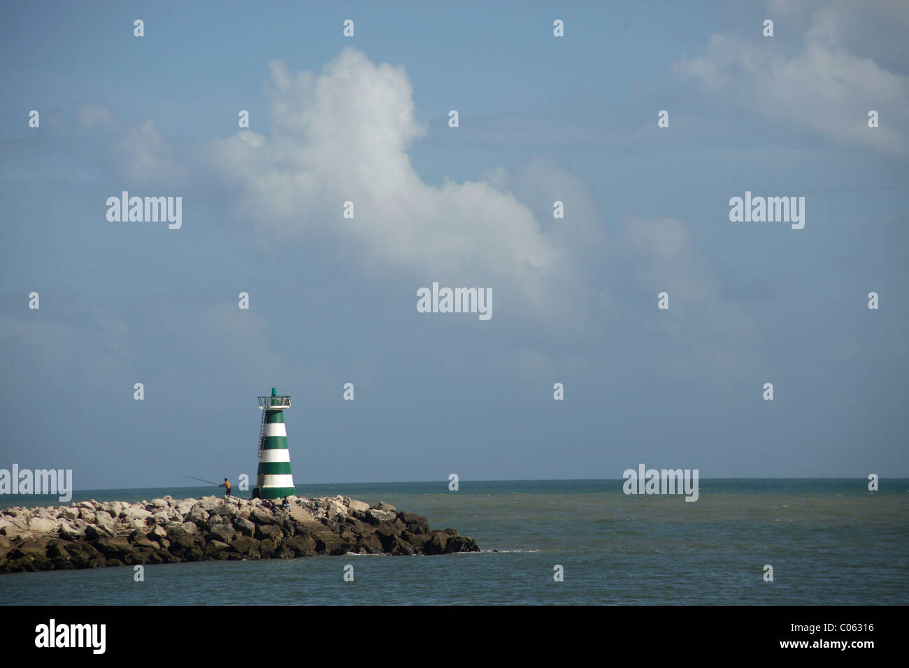 Lighthouse at the harbor entrance in Vilamoura, Algarve, Portugal, Europe Stock Photo