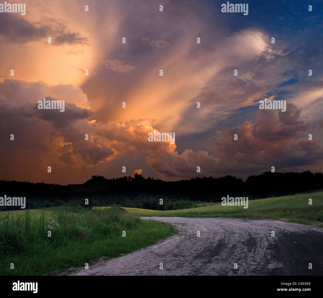 Mysterious way road and dramatic sky Stock Photo