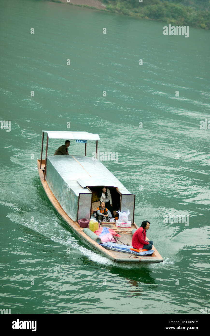 Chinese people on a boat an Yangtze river Stock Photo