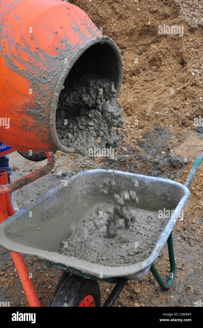 Mixing concrete with cement mixer. Dorset, UK February 2011 Stock Photo