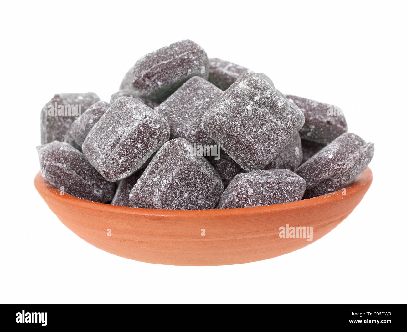Licorice candy drops in small bowl Stock Photo Alamy