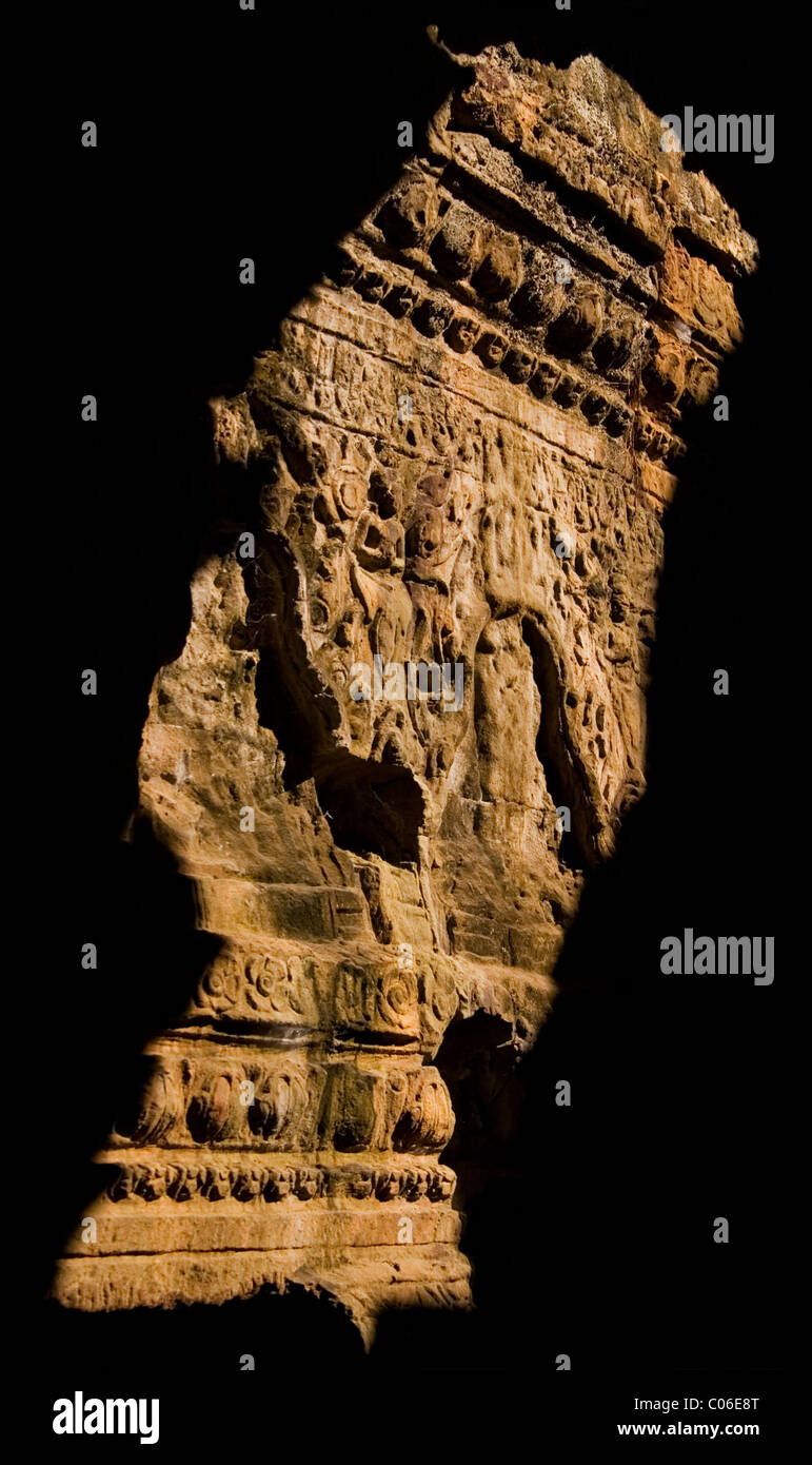 Sunlit bass relief, Kingdom of Angkor, Siem Reap, Cambodia. Stock Photo