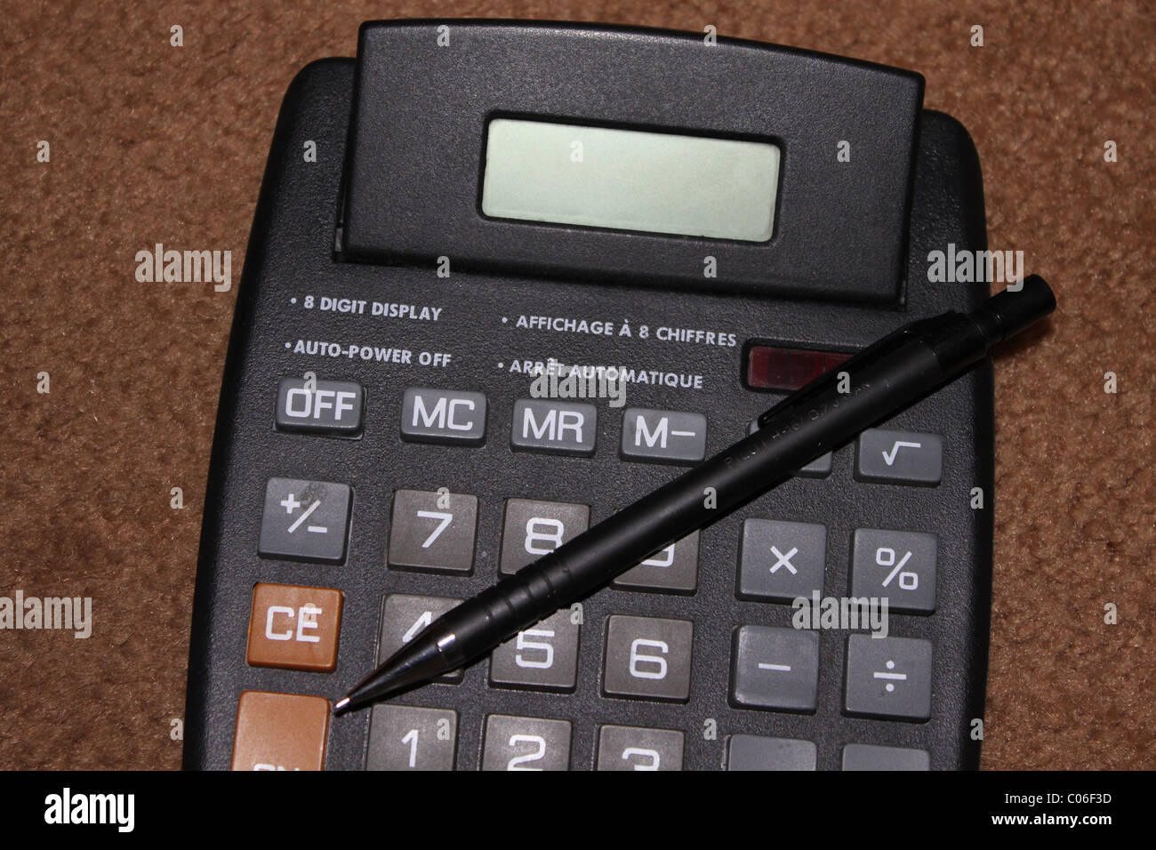 Bilingual Calculator and pen numbers Stock Photo