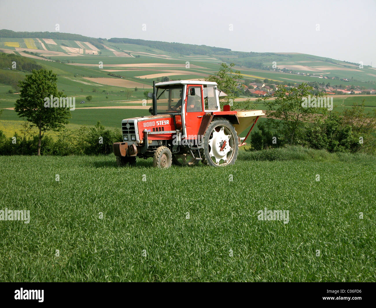 Farmer working in the fields Stock Photo