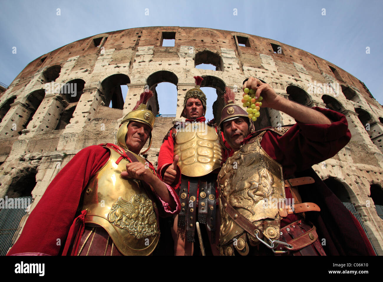Actors dressed as gladiators in front of the Colosseum, Rome, Italy, Europe Stock Photo