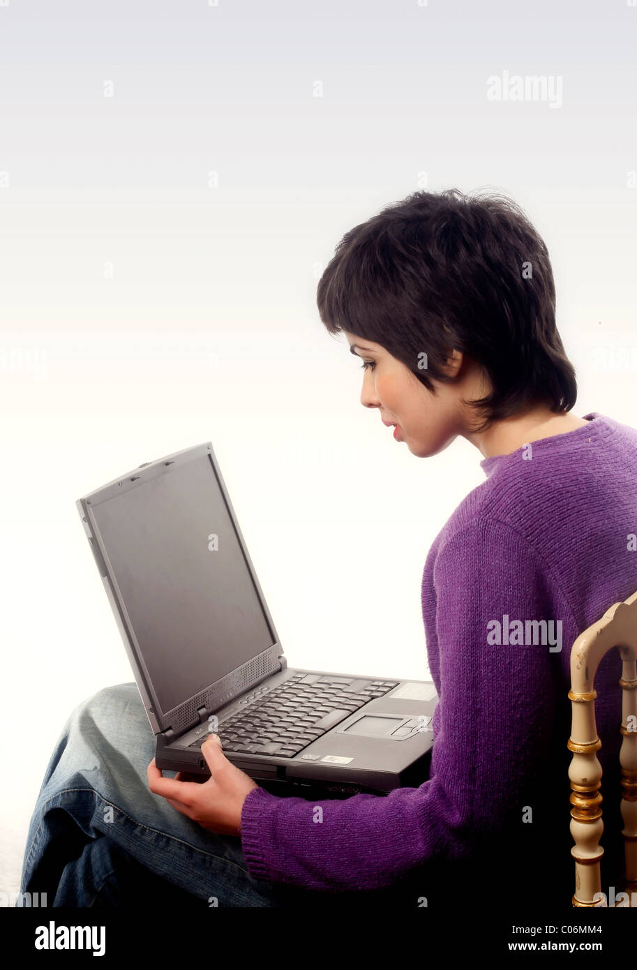 Latin girl with a laptop Stock Photo